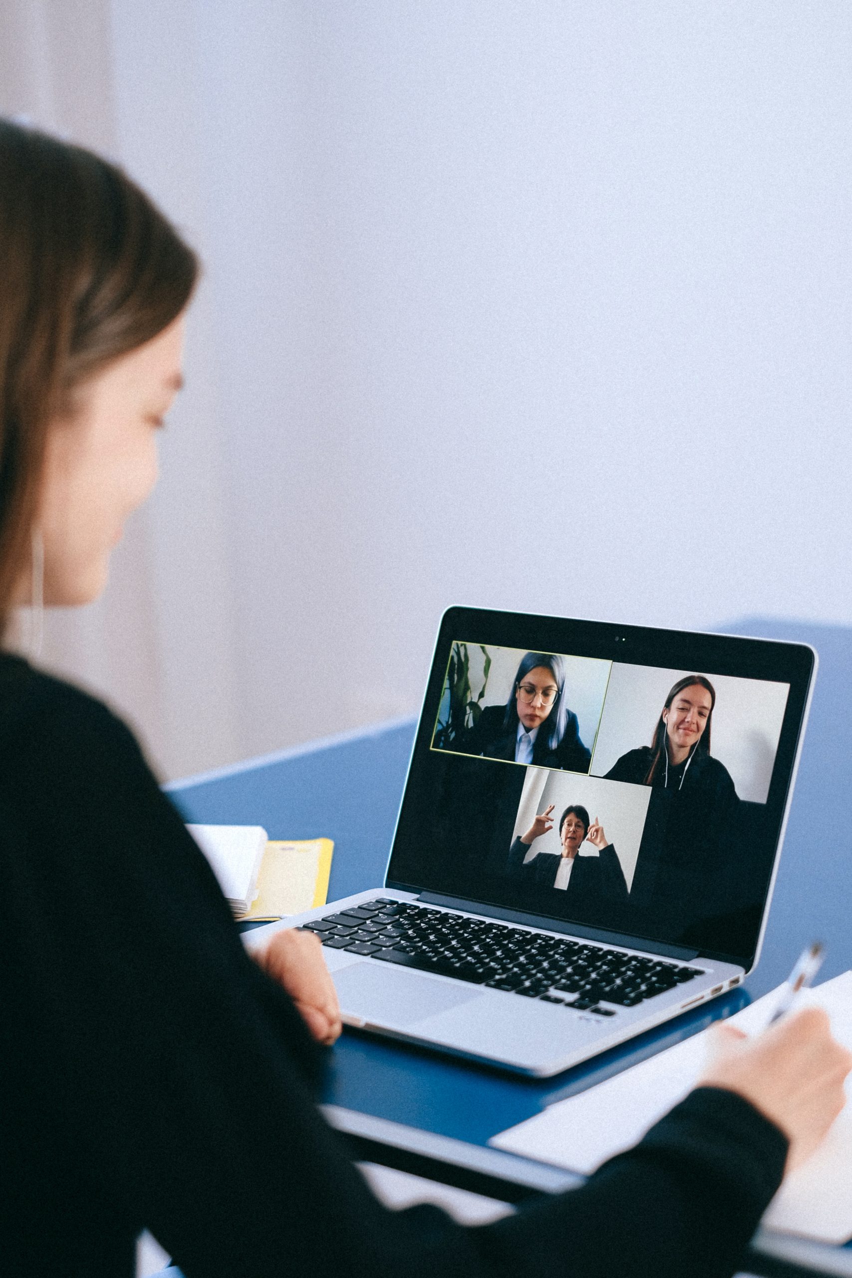 Person on a zoom call with people in their staff network