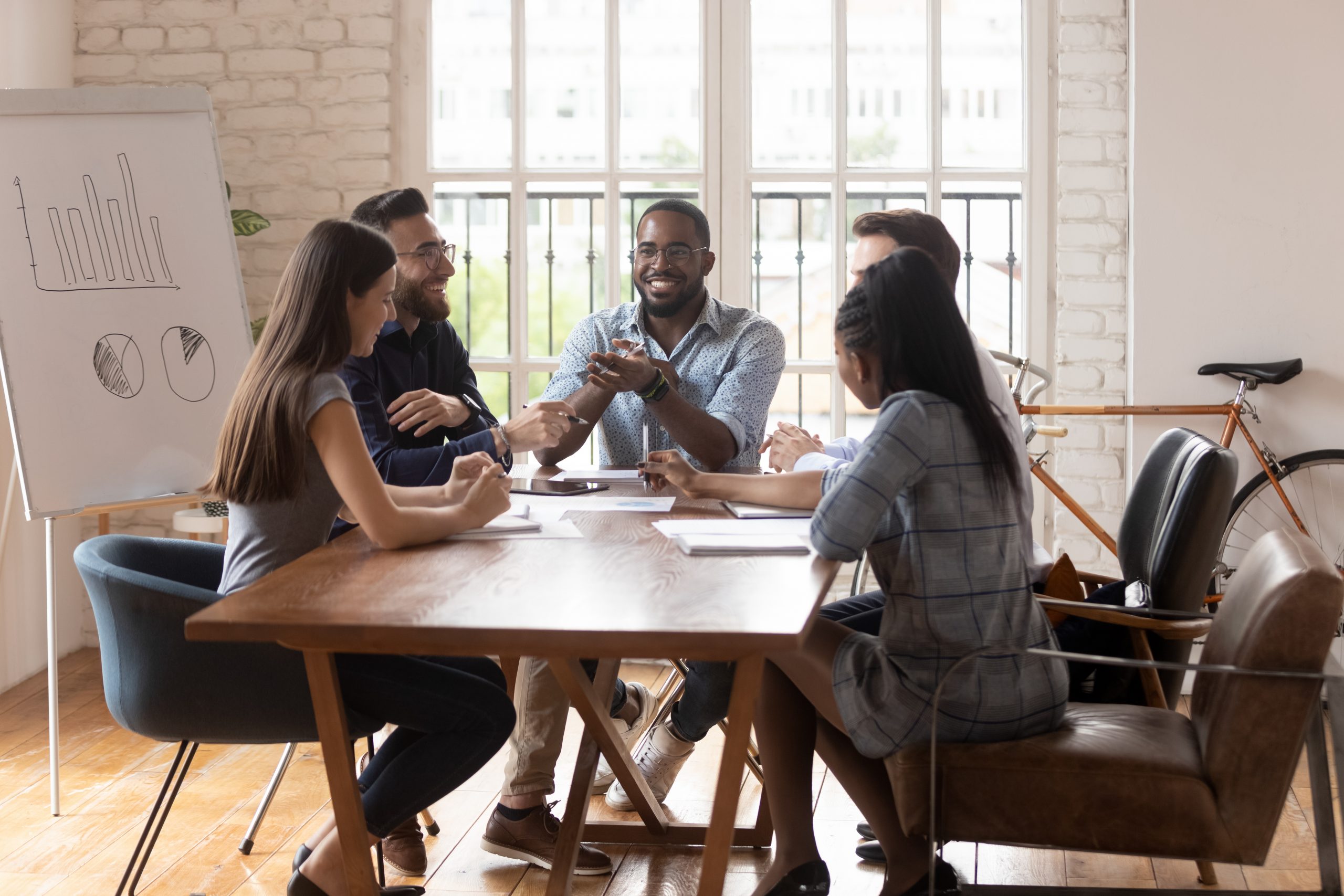 Diverse group of people having a meeting about inclusion