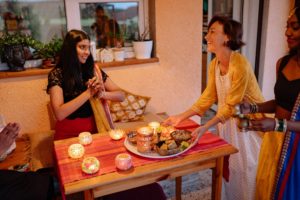 Family celebrating Diwali with food