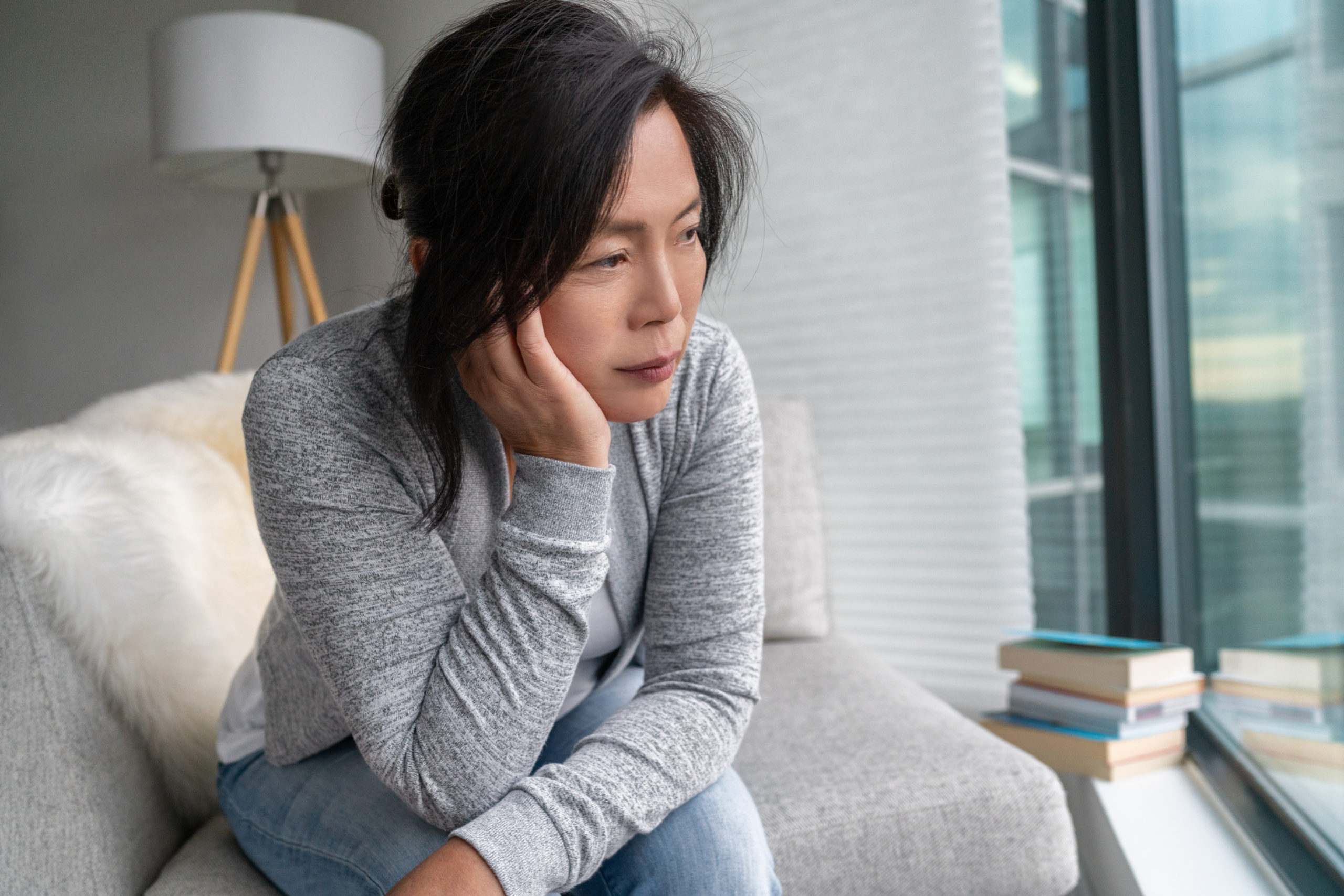 Person experiencing menopause symptoms
