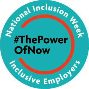 Green circle with the words 'National Inclusion Week Inclusive Employers' around the edge. In the middle the words #ThePowerOfNow are surrounded by a red circular line