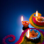 Oil,Lamps,Lit,On,Colorful,Rangoli,During,Diwali,Celebration