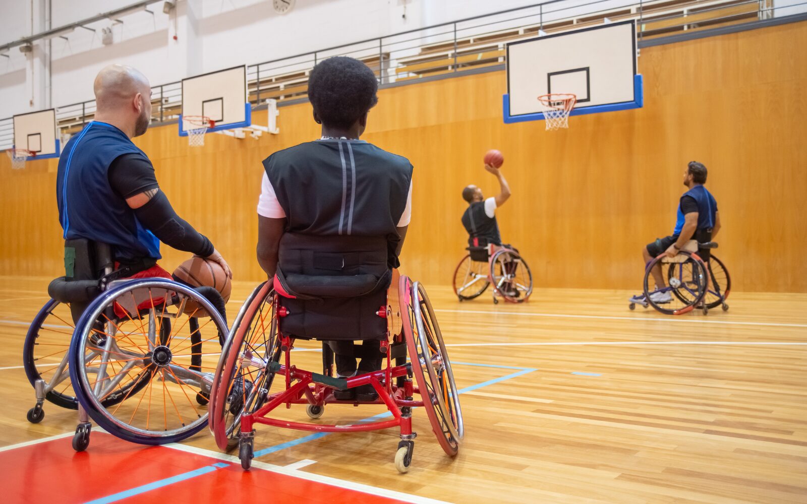 Disabled athletes playing wheelchair basketball