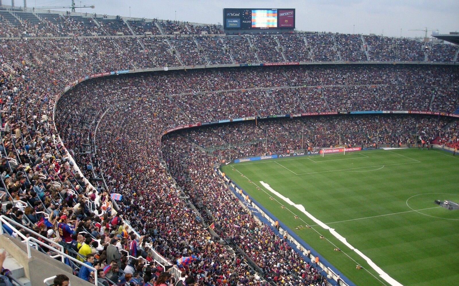 A pan shot of a crowded football stadium